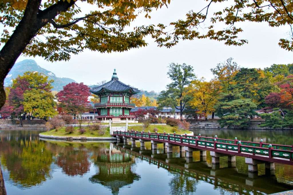 South Korea Unveiled Gyeongbokgung Palace in the Middle of the Lake Surrounded with Autumn Trees